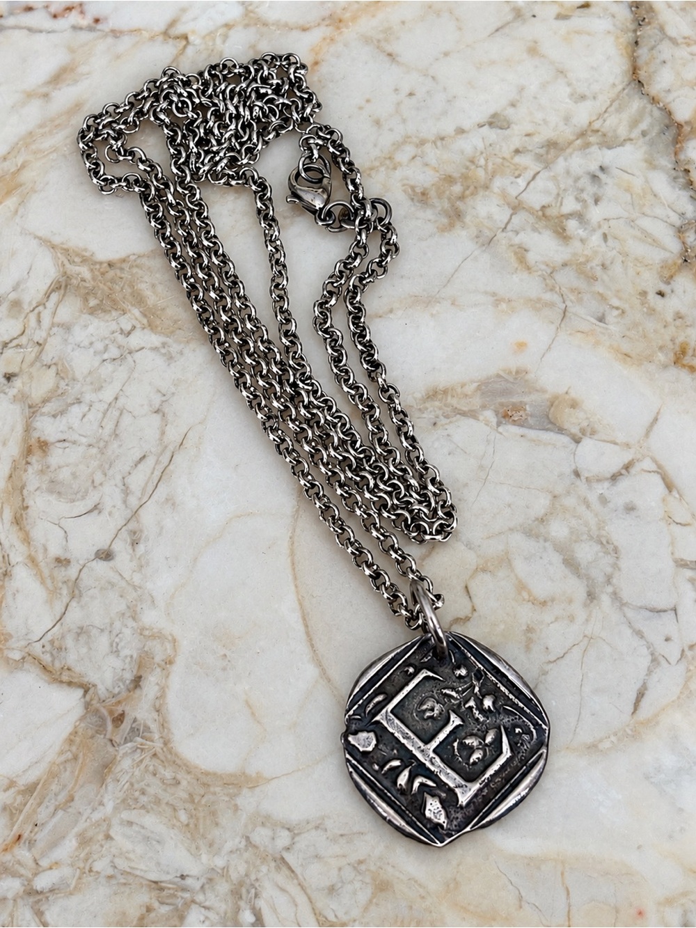 Waxing Poetic Sterling Silver Century Insignia Initial “E”Charm /24” Rollo Chain